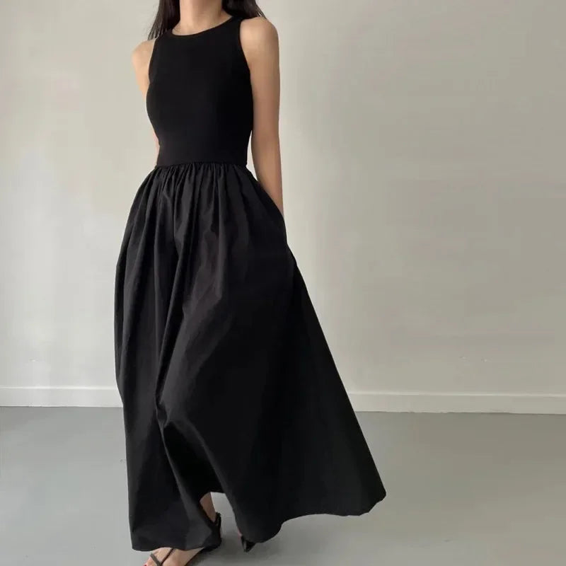 Glow Unbound LLC black midi dress with round neckline