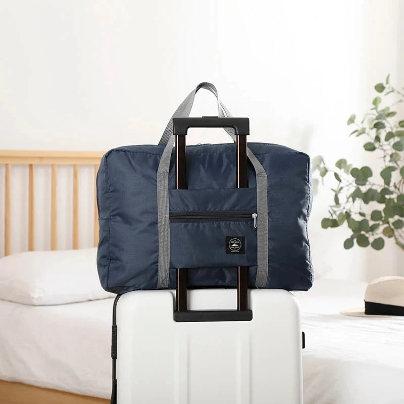 Glow Unbound LLC foldable travel duffel bag
