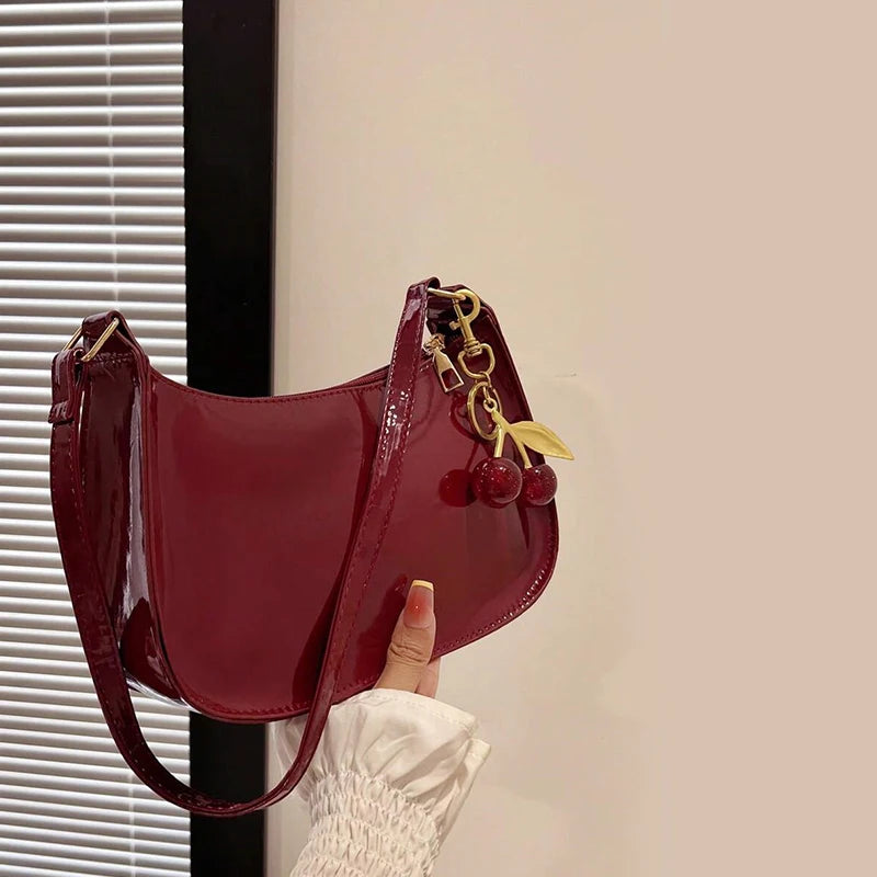Glow Unbound LLC PU leather cherry pendant shoulder bag