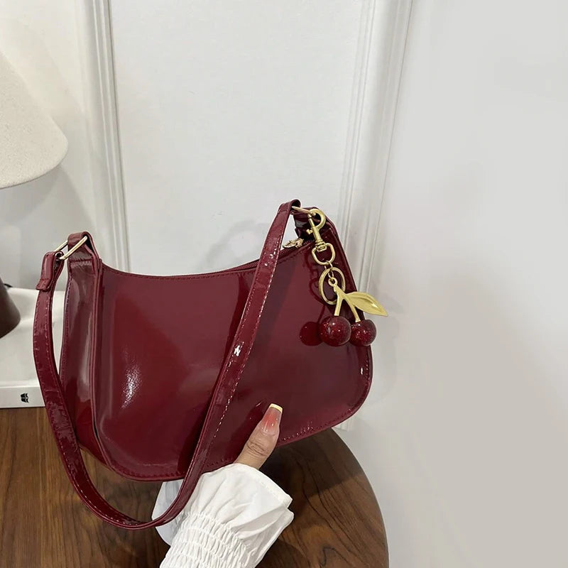 Glow Unbound LLC PU leather cherry pendant shoulder bag