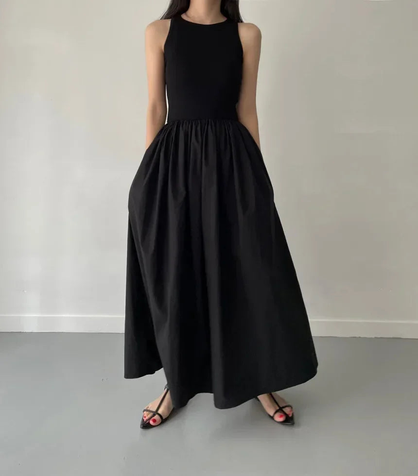 Glow Unbound LLC black midi dress with round neckline