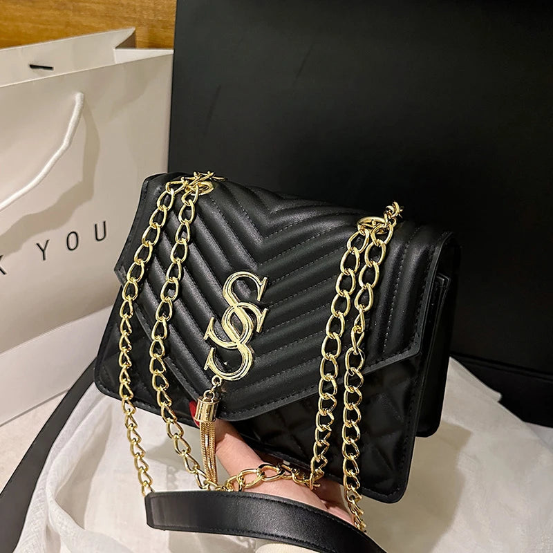Glow Unbound LLC argyle quilted square crossbody bag