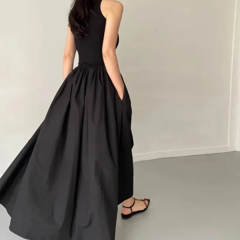 Glow Unbound LLC black midi dress with round neckline