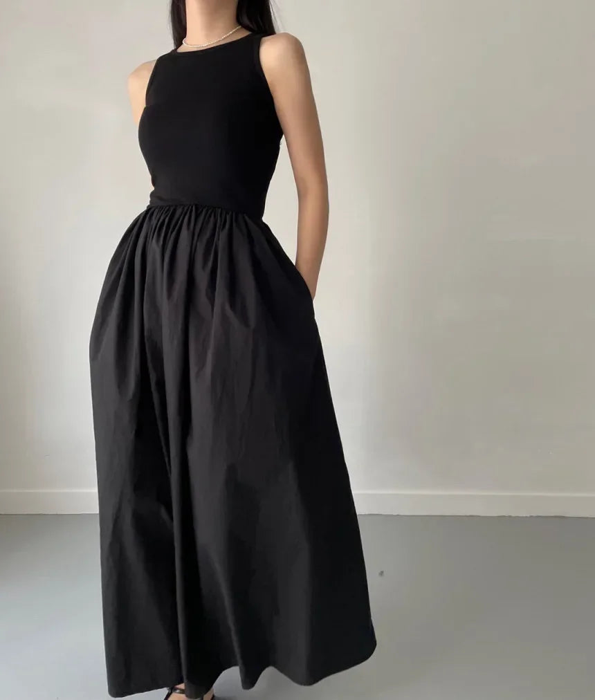 Glow Unbound LLC black midi dress with round neckline