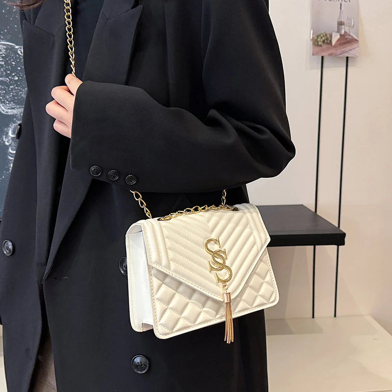 Glow Unbound LLC argyle quilted square crossbody bag