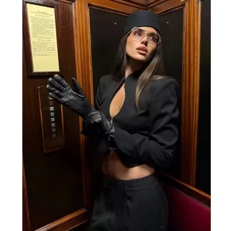 Glow Unbound LLC black cut-out stand collar blouse