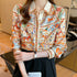 Glow Unbound LLC white floral print button-up blouse