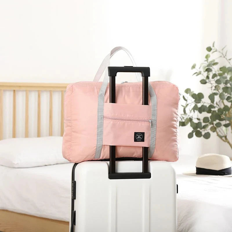 Glow Unbound LLC foldable travel duffel bag