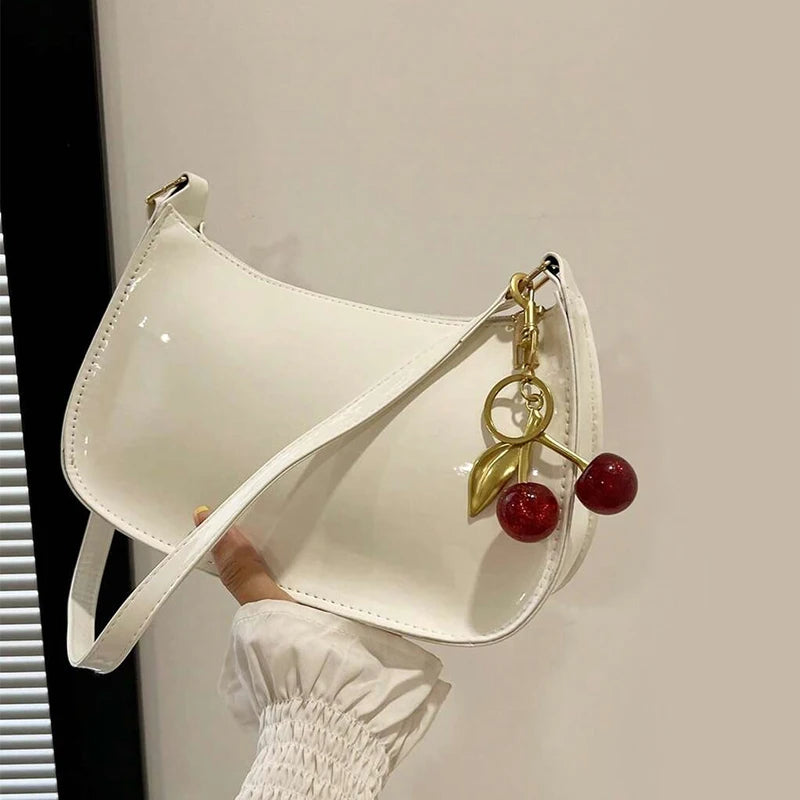 Glow Unbound LLC PU leather cherry pendant shoulder bag