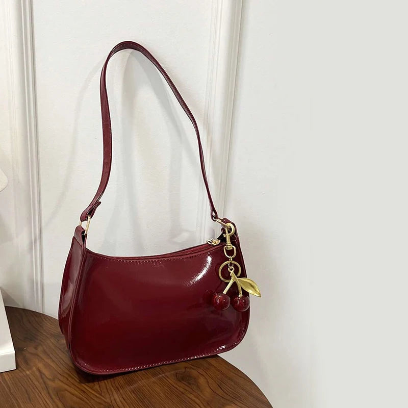 Glow Unbound LLC PU leather cherry pendant shoulder bag