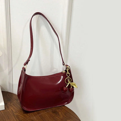 Glow Unbound LLC PU leather cherry pendant shoulder bag