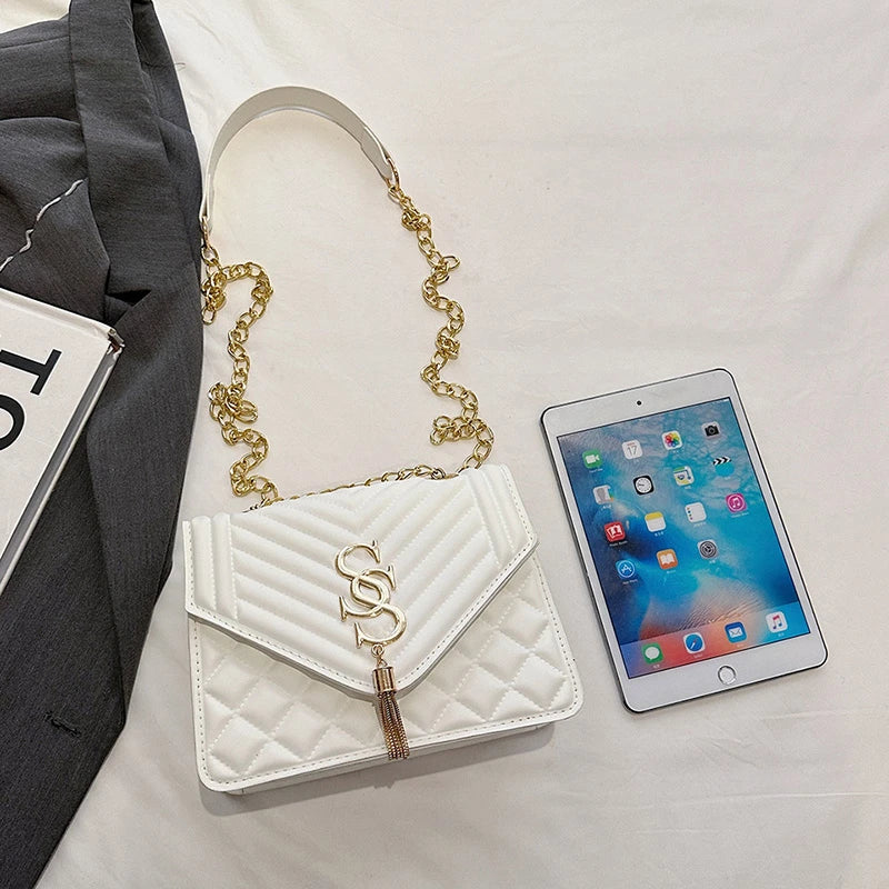 Glow Unbound LLC argyle quilted square crossbody bag