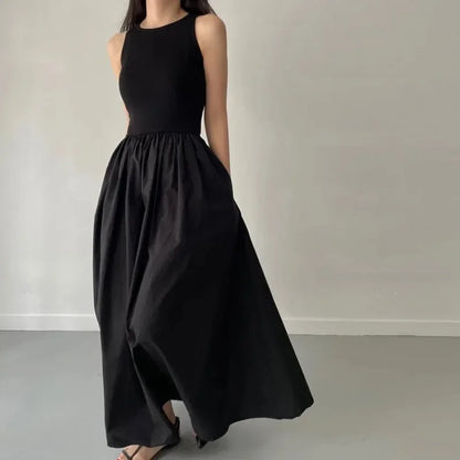 Glow Unbound LLC black midi dress with round neckline