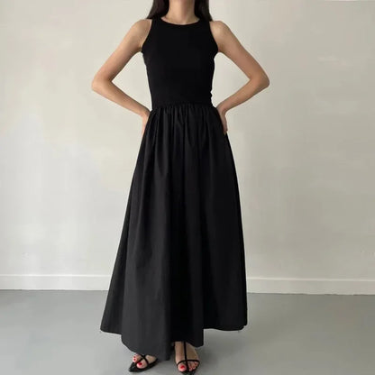Glow Unbound LLC black midi dress with round neckline