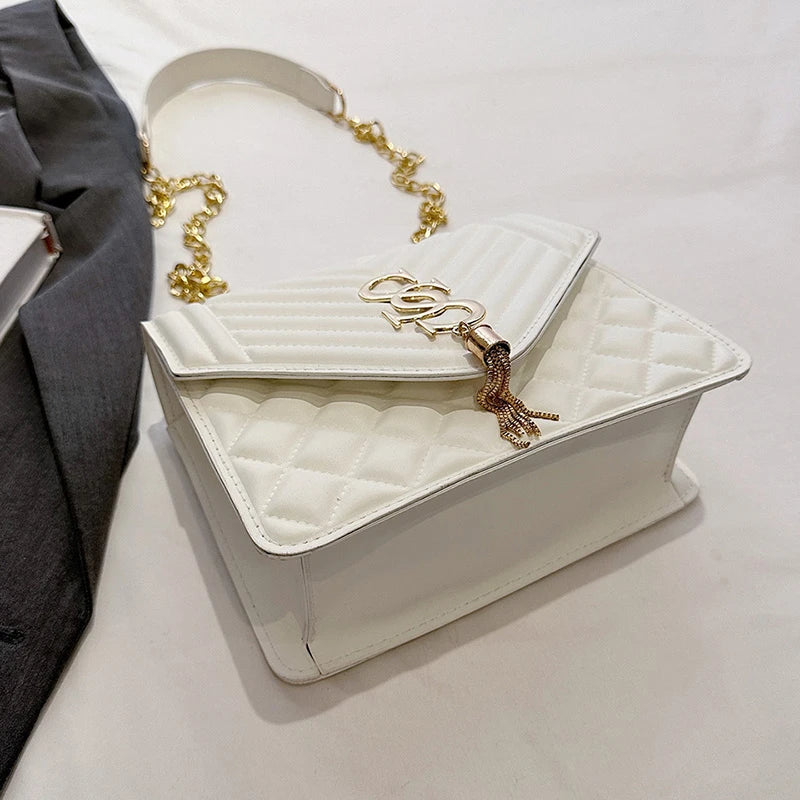 Glow Unbound LLC argyle quilted square crossbody bag