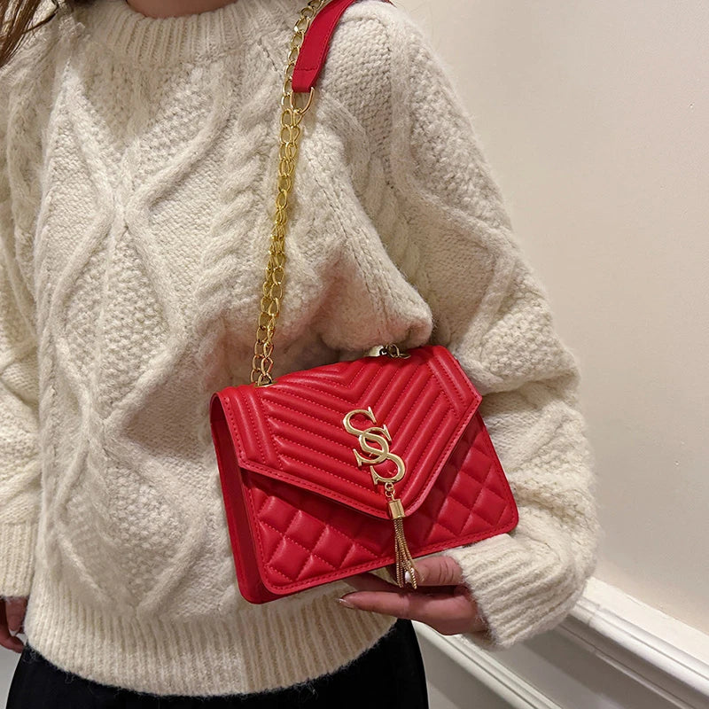 Glow Unbound LLC argyle quilted square crossbody bag