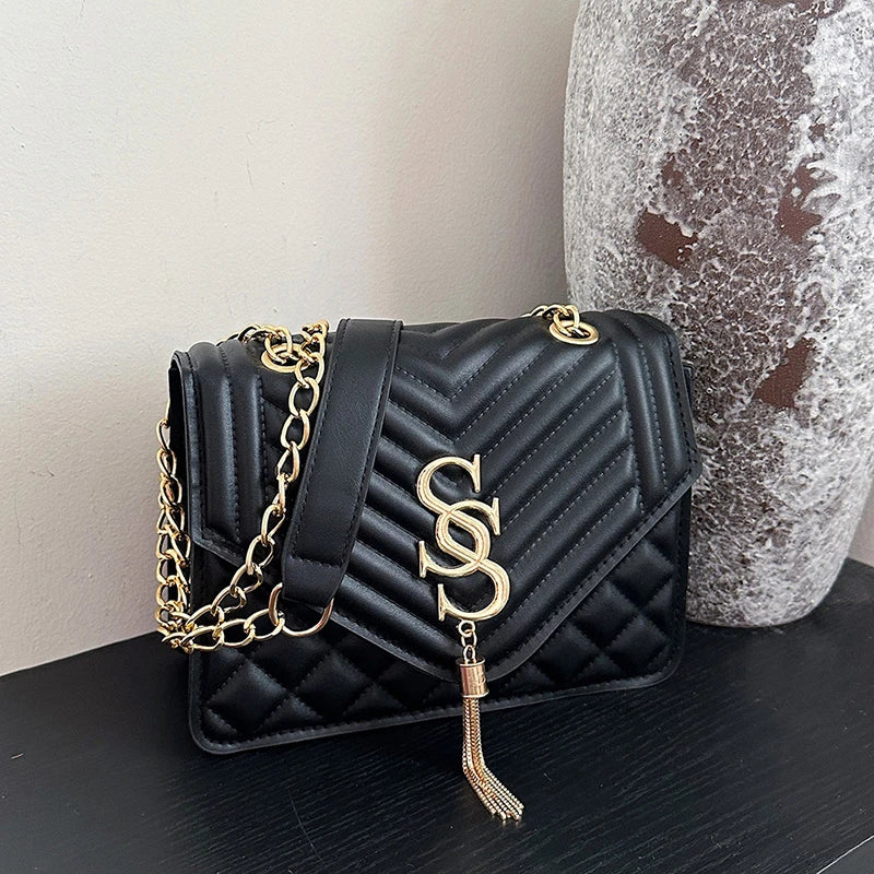 Glow Unbound LLC argyle quilted square crossbody bag