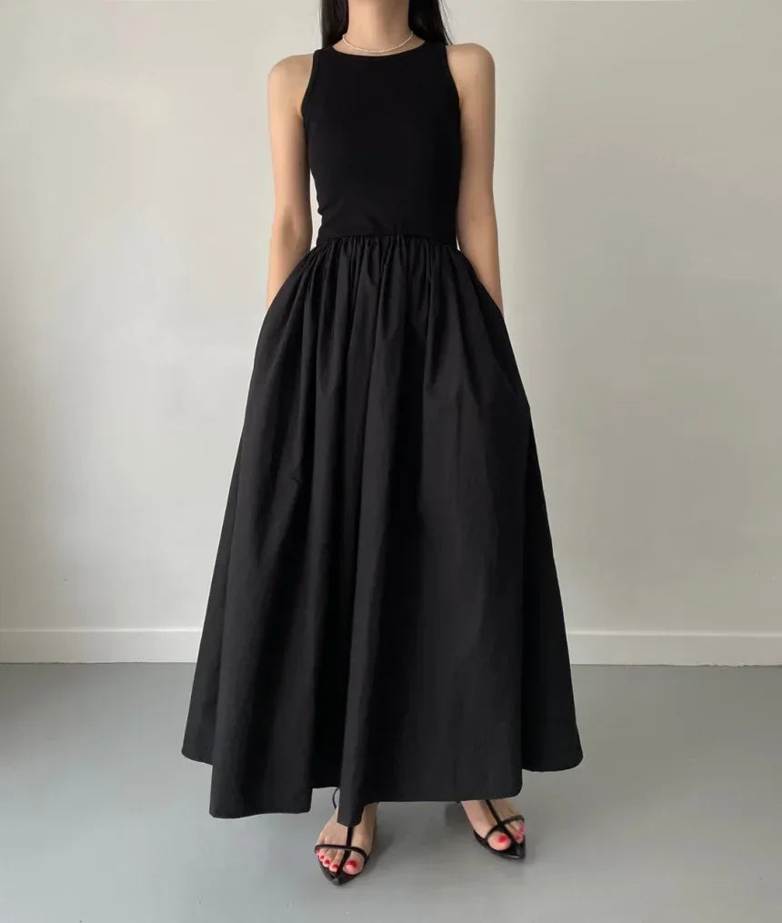 Glow Unbound LLC black midi dress with round neckline