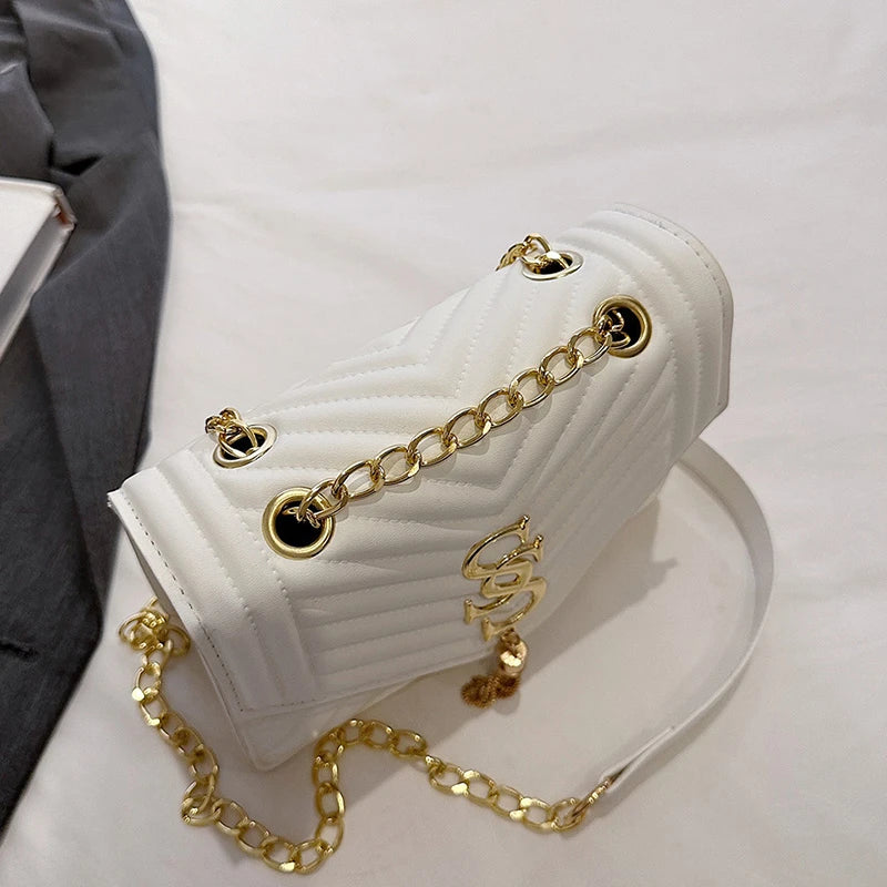 Glow Unbound LLC argyle quilted square crossbody bag