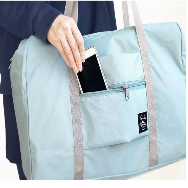 Glow Unbound LLC foldable travel duffel bag