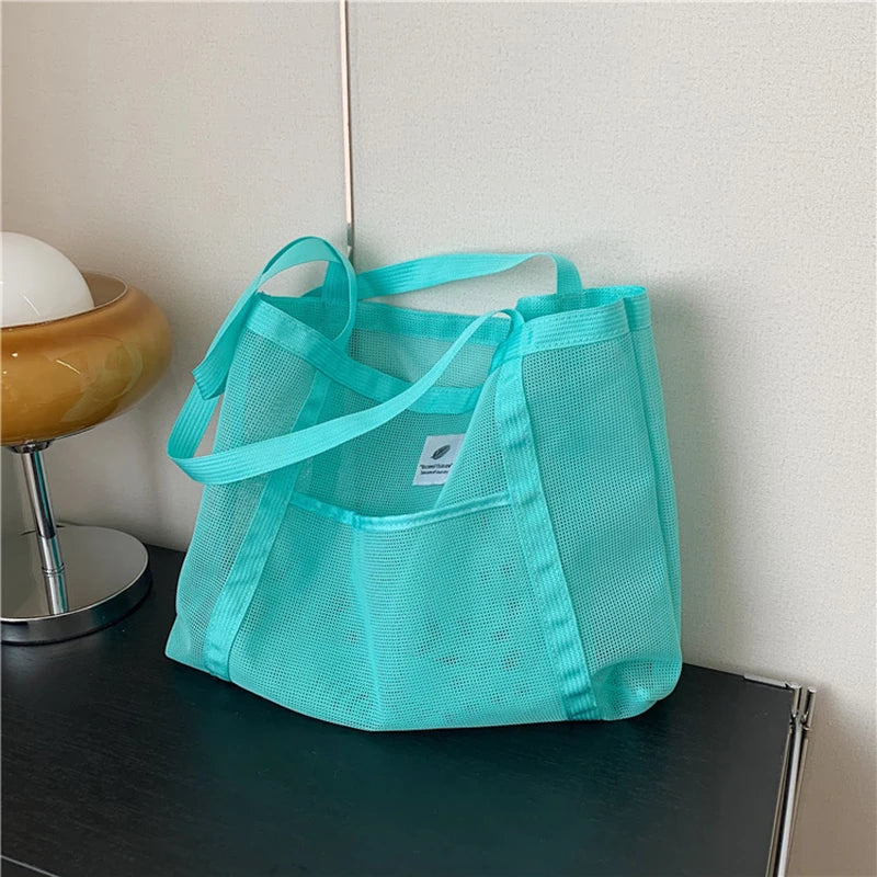 Glow Unbound LLC transparent mesh shoulder tote bag