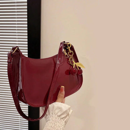 Glow Unbound LLC PU leather cherry pendant shoulder bag