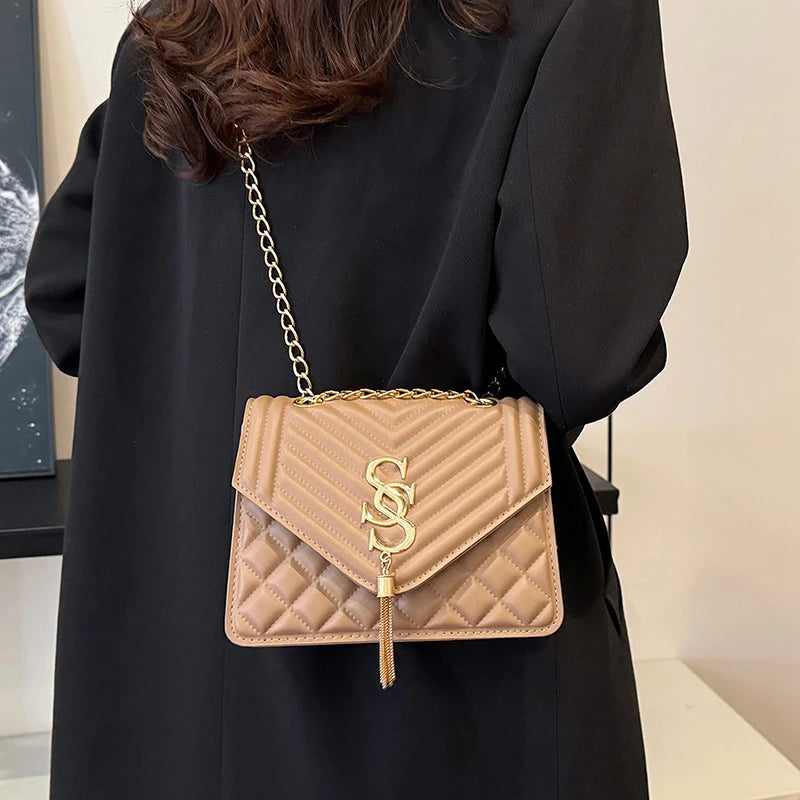 Glow Unbound LLC argyle quilted square crossbody bag