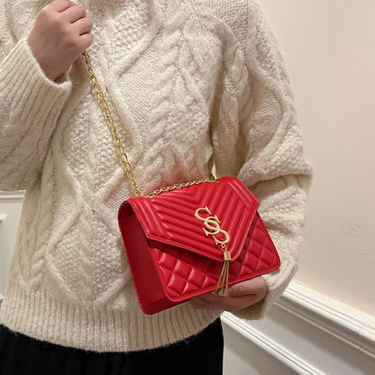 Glow Unbound LLC argyle quilted square crossbody bag