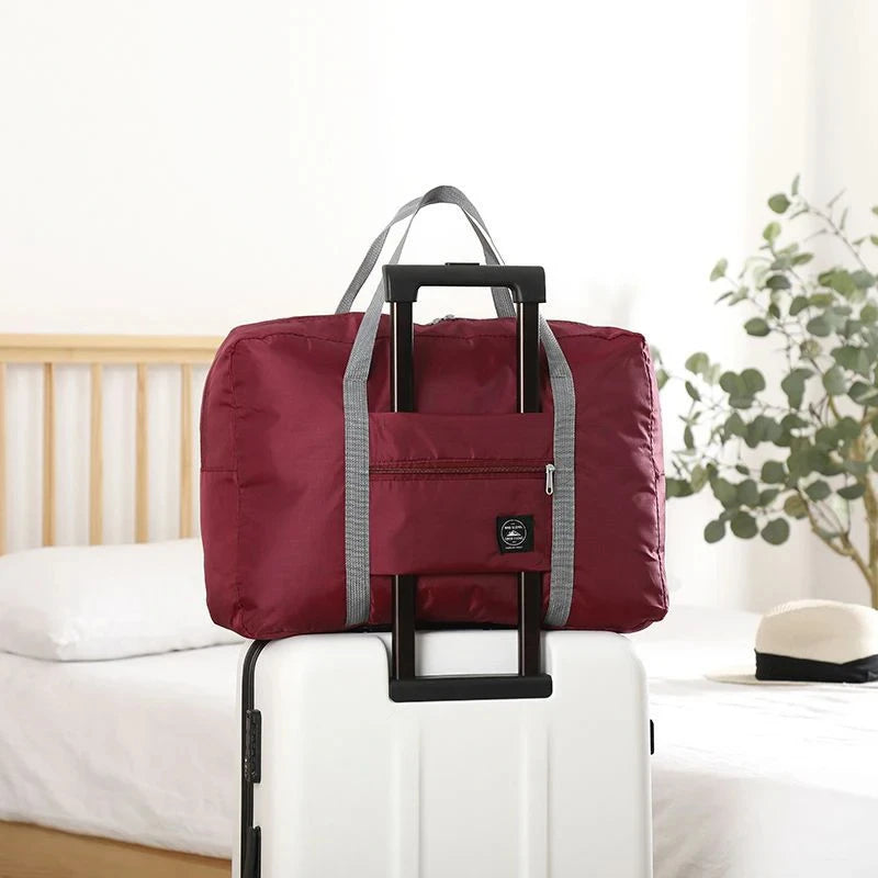 Glow Unbound LLC foldable travel duffel bag
