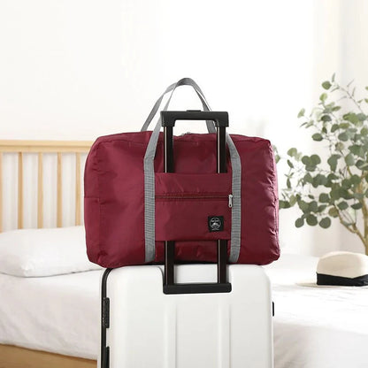 Glow Unbound LLC foldable travel duffel bag