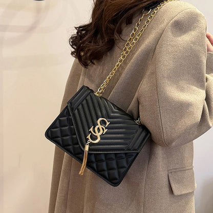 Glow Unbound LLC argyle quilted square crossbody bag