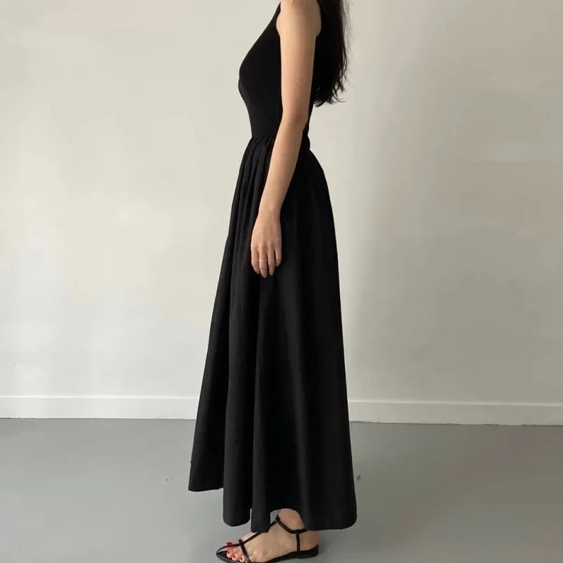 Glow Unbound LLC black midi dress with round neckline