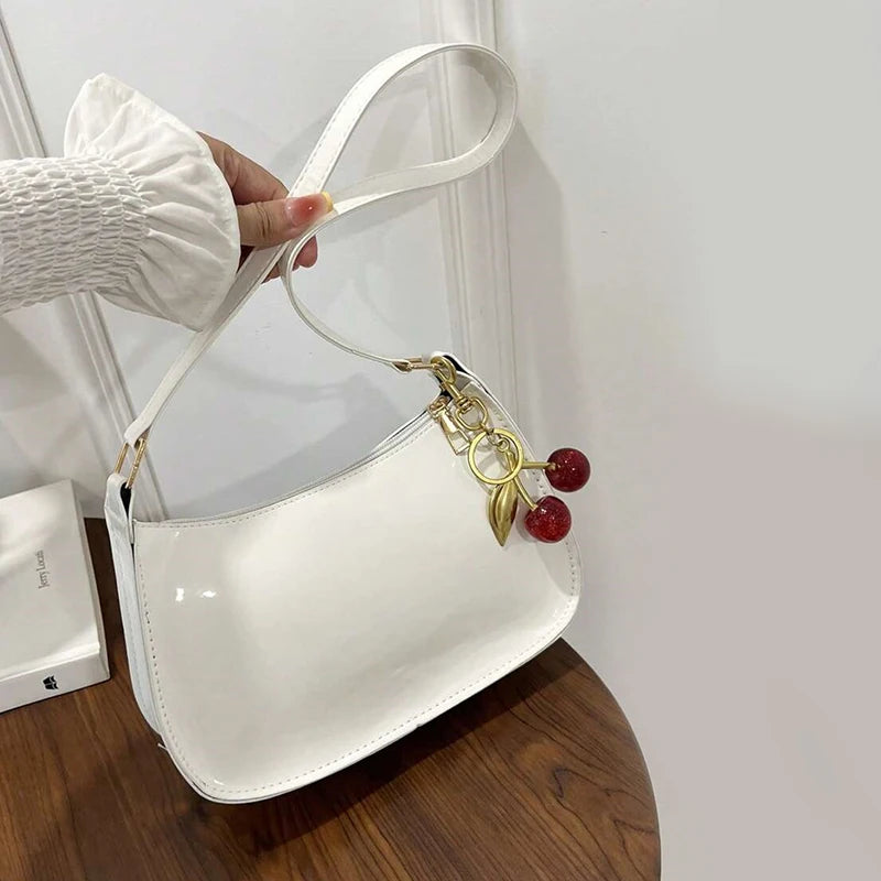 Glow Unbound LLC PU leather cherry pendant shoulder bag