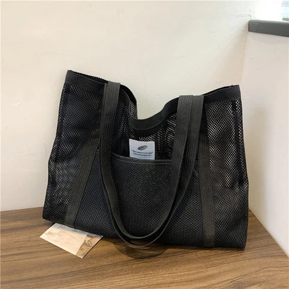 Glow Unbound LLC transparent mesh shoulder tote bag