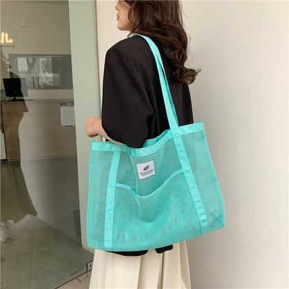Glow Unbound LLC transparent mesh shoulder tote bag
