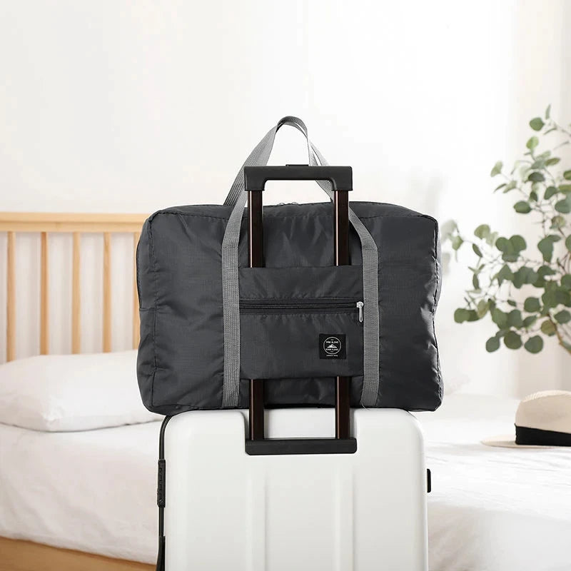 Glow Unbound LLC foldable travel duffel bag