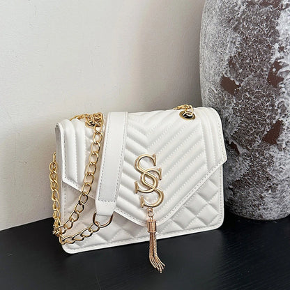 Glow Unbound LLC argyle quilted square crossbody bag