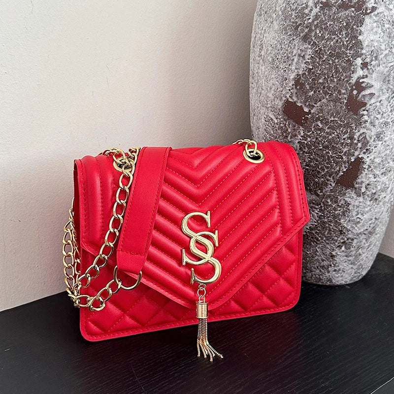 Glow Unbound LLC argyle quilted square crossbody bag