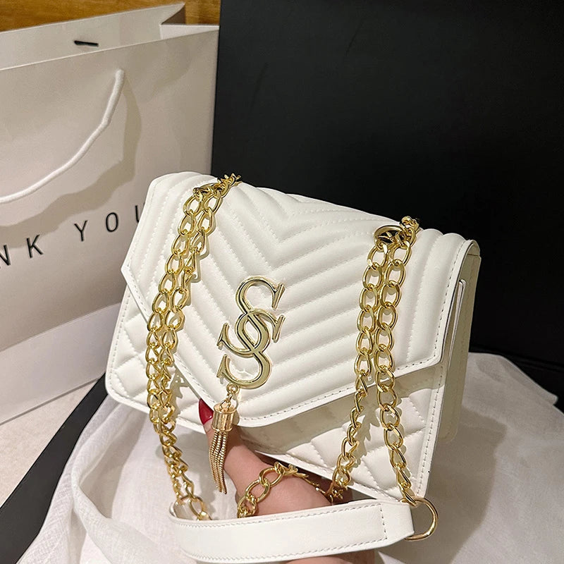 Glow Unbound LLC argyle quilted square crossbody bag