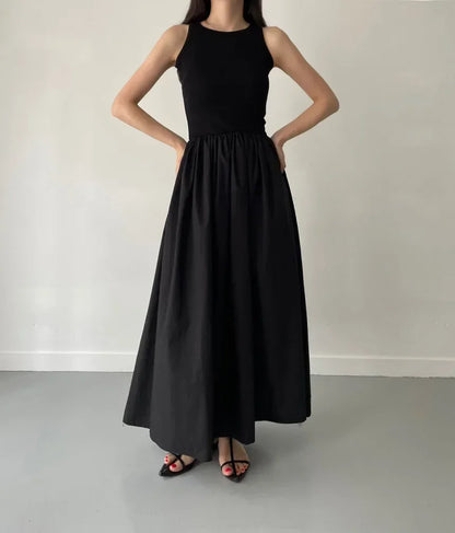 Glow Unbound LLC black midi dress with round neckline