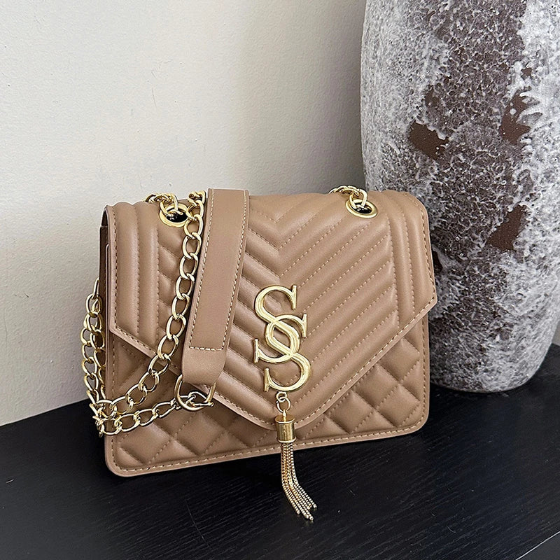 Glow Unbound LLC argyle quilted square crossbody bag