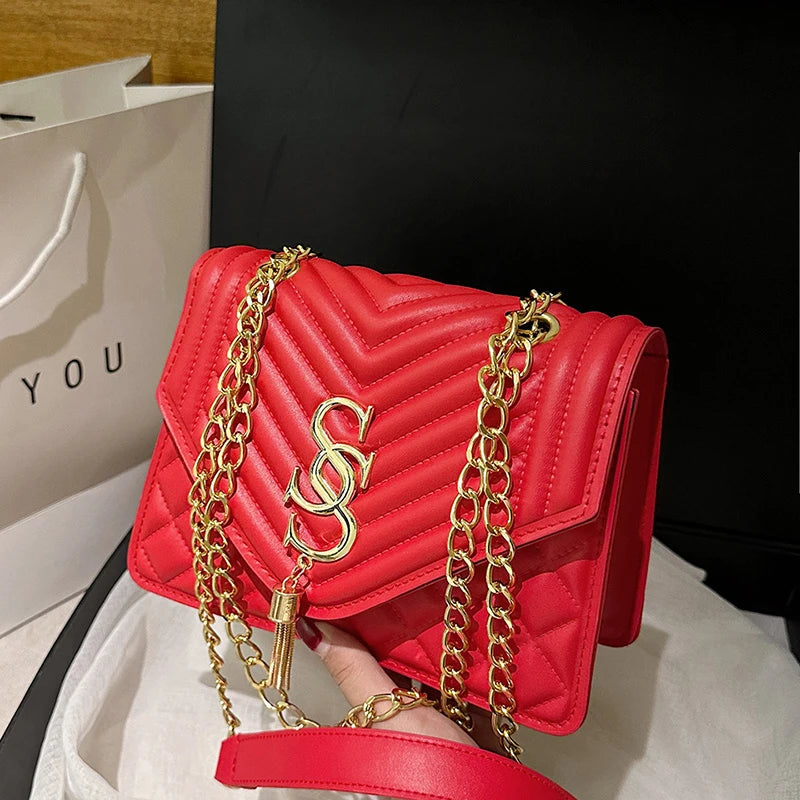Glow Unbound LLC argyle quilted square crossbody bag