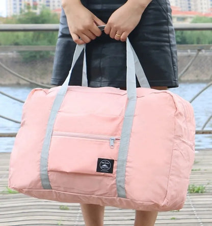 Glow Unbound LLC foldable travel duffel bag