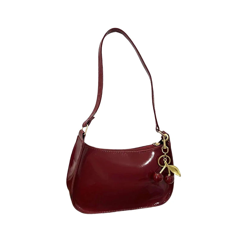 Glow Unbound LLC PU leather cherry pendant shoulder bag