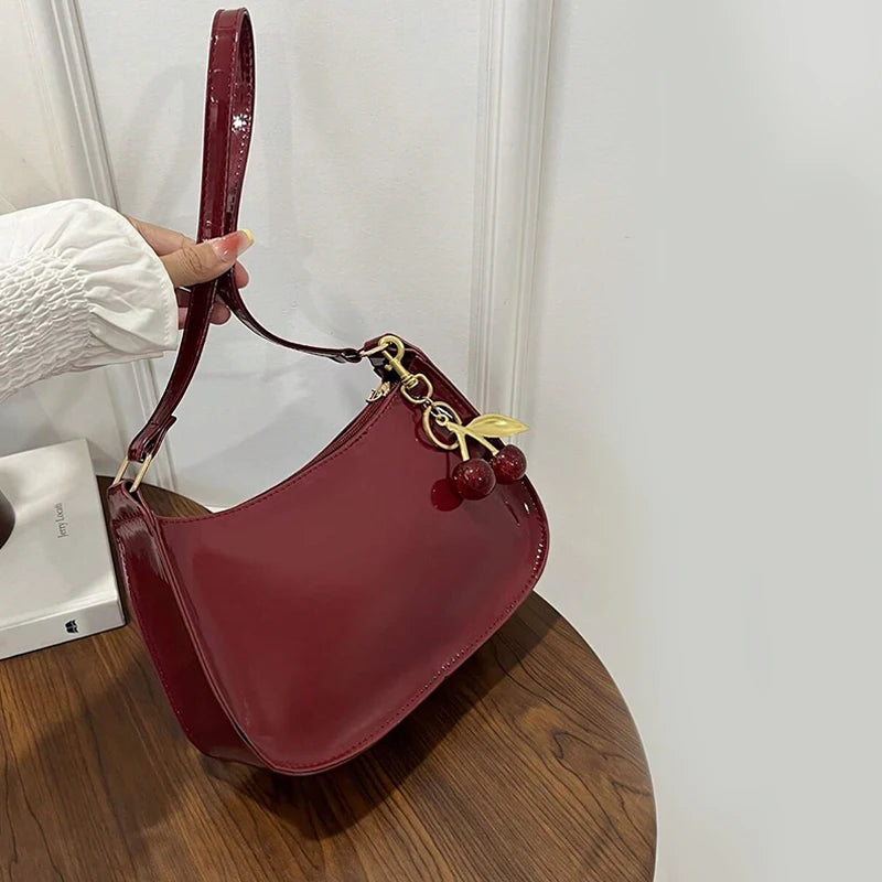 Glow Unbound LLC PU leather cherry pendant shoulder bag