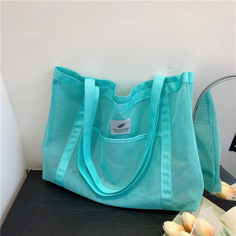 Glow Unbound LLC transparent mesh shoulder tote bag