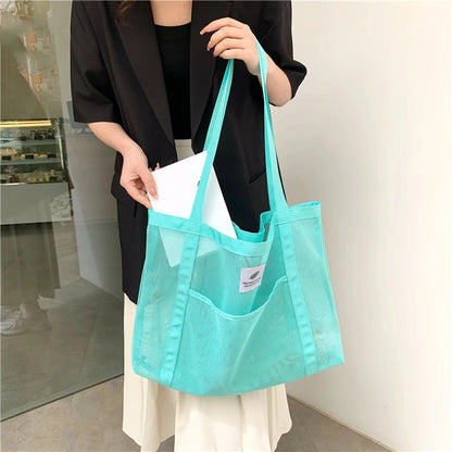 Glow Unbound LLC transparent mesh shoulder tote bag