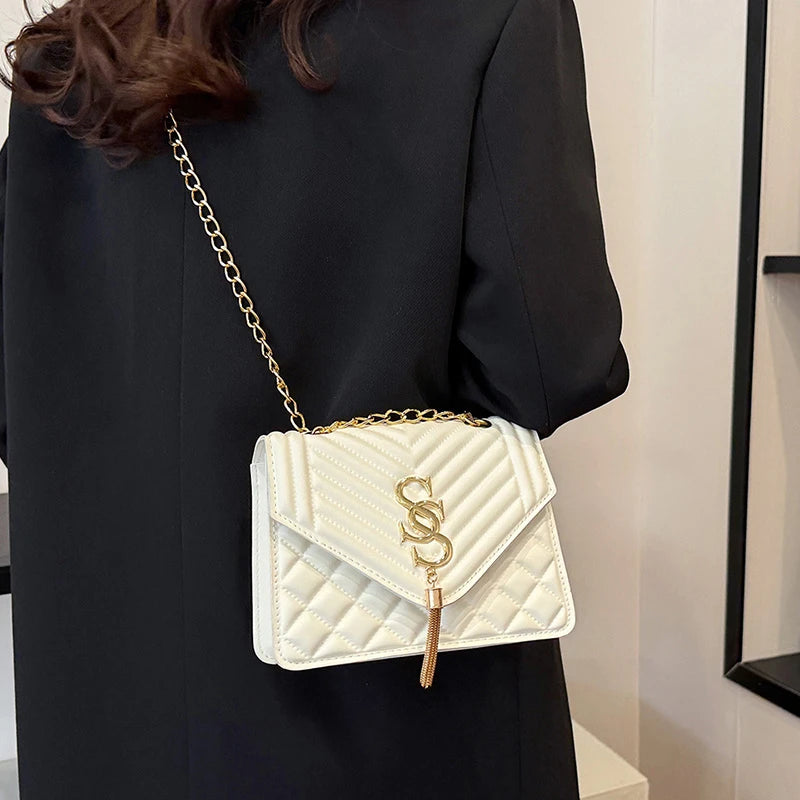 Glow Unbound LLC argyle quilted square crossbody bag
