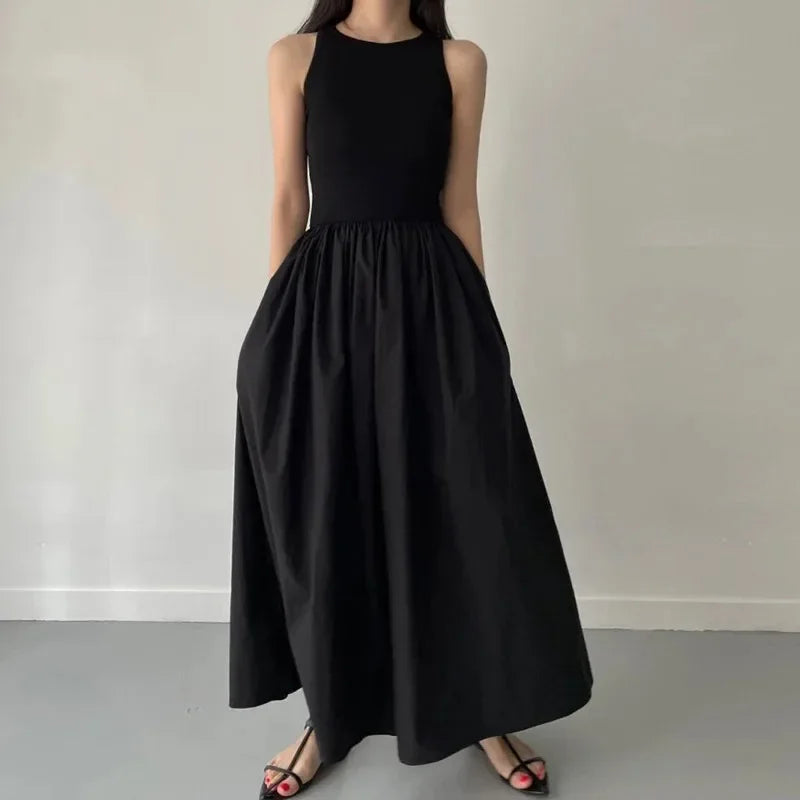 Glow Unbound LLC black midi dress with round neckline