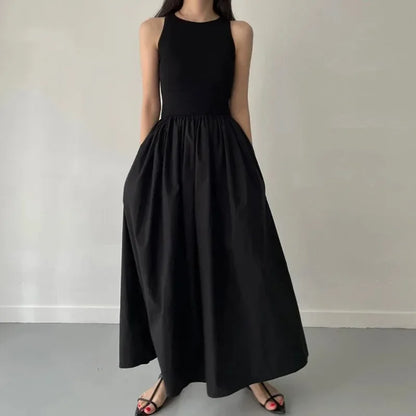 Glow Unbound LLC black midi dress with round neckline